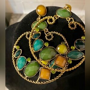 Large multi-colored dangle hoops.